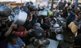 Israel says it will let food into Gaza after announcing new ground operations