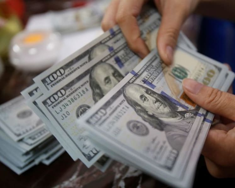US dollar edges up on positioning moves, but outlook stays negative