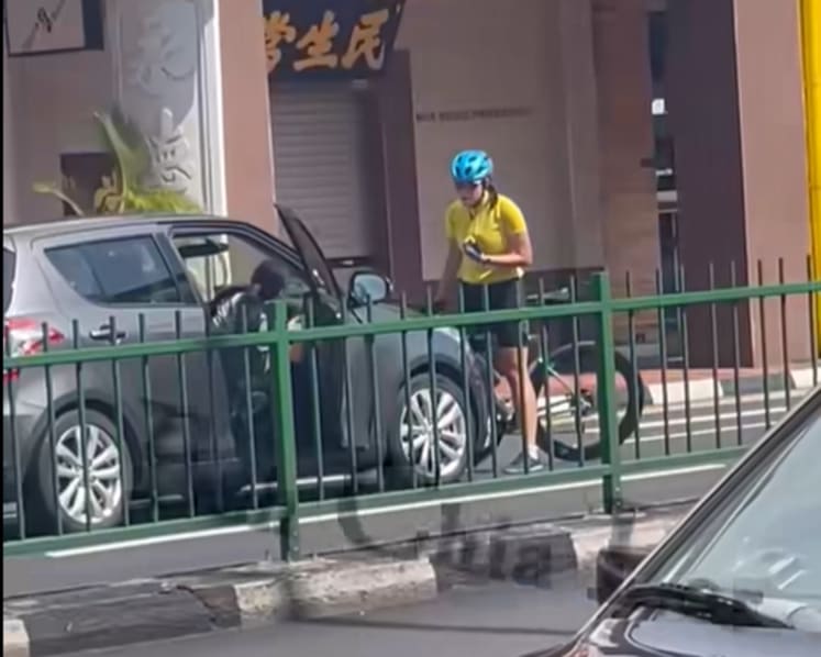 Car drives off with cyclist on bonnet after alleged altercation in Katong, 2 women assisting in police probe