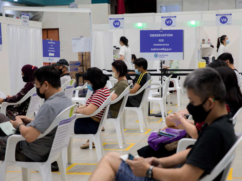 People waiting to get their jabs at a Covid-19 vaccination centre in Yew Tee Community Centre on April 21, 2021. People waiting to get their jabs at a Covid-19 vaccination centre in Yew Tee Community Centre on April 21, 2021.