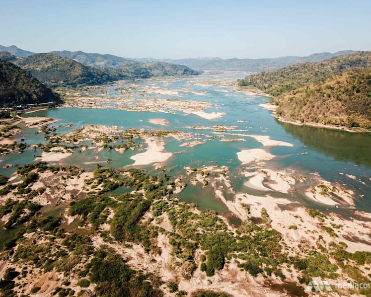 'The colour is blue’: Strange changes to Mekong River as hydropower dams and climate change make their mark