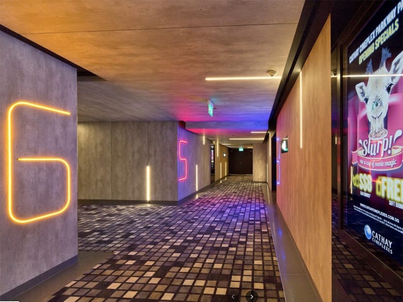 The corridor leading to cinema halls at a Cathay Cineplex. The corridor leading to cinema halls at a Cathay Cineplex.