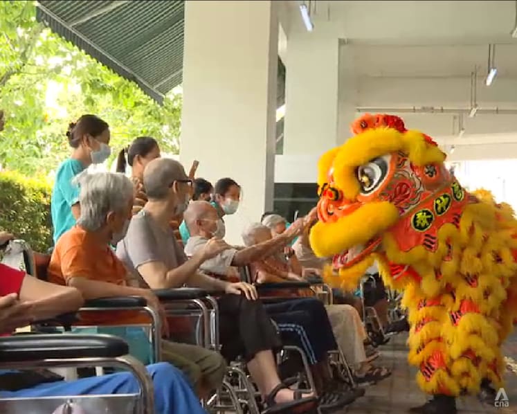 Nursing homes bring Chinese New Year cheer to seniors with lion dances, festive feasts