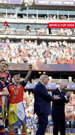 Trump stays on stage as Spain lift World Cup trophy, Infantino tries to coax him away