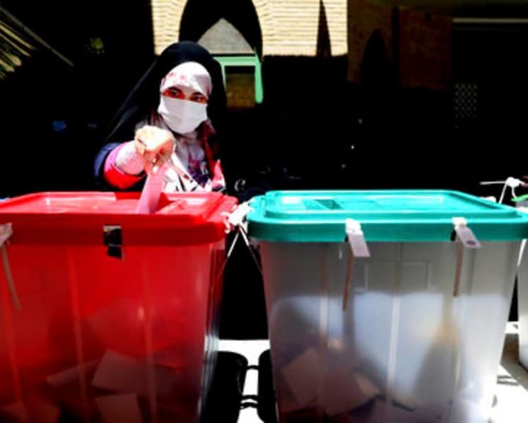 In Iran's subdued election, many voters appear to stay home