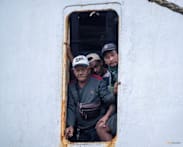 Indonesia recovers three bodies as effort begins to right capsized ship