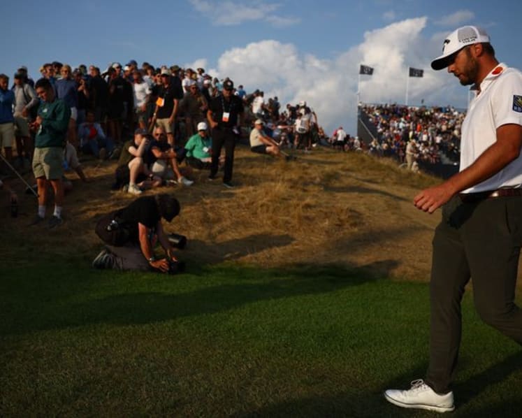 Burns seizes Open lead, DeChambeau shrugs off penalty to stay in the mix