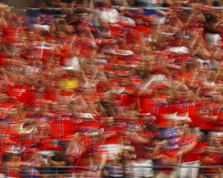 Mass 'Viking row', uprooted plants and dented trains as Norway World Cup fans celebrate