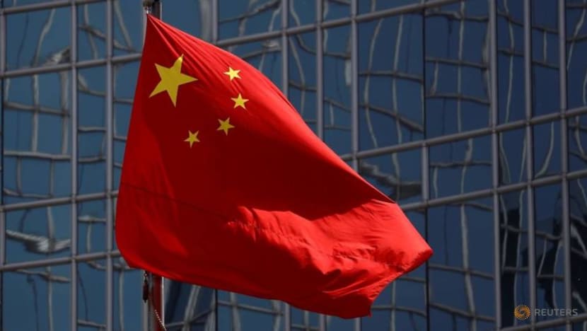 China approves amendments outlawing insulting national flag