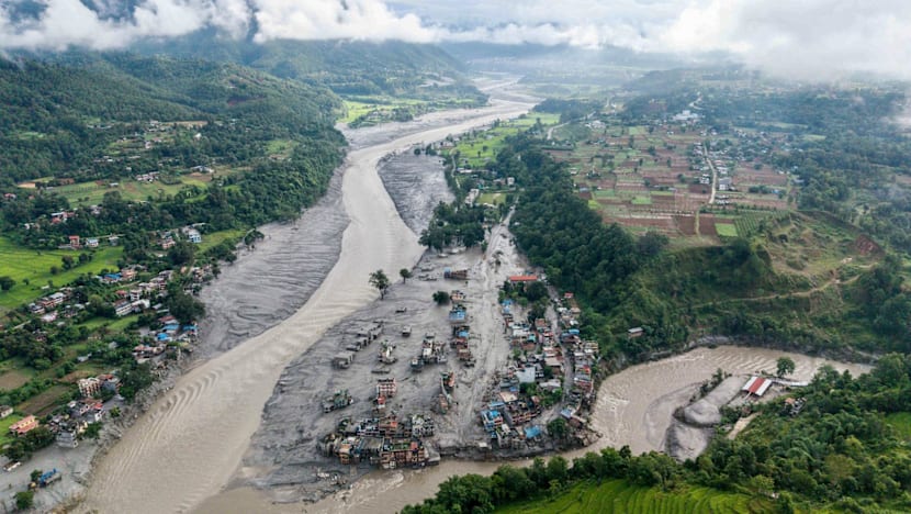 Death toll from Nepal-Tibet floods rises to over 450 as rescuers continue search for those missing