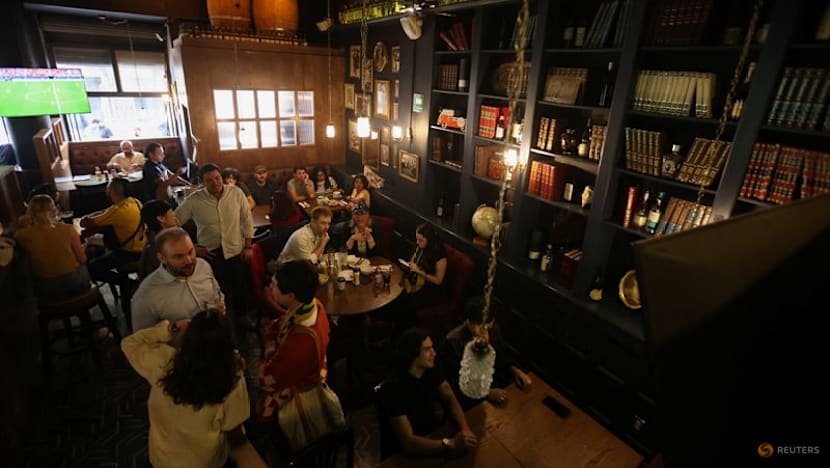 Two flags, one bar: a Mexico City pub prepares for Azteca showdown