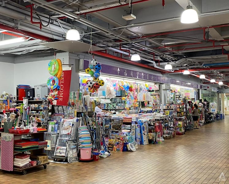 Beauty World Centre shop ordered to remove display racks encroaching on common space at storefront