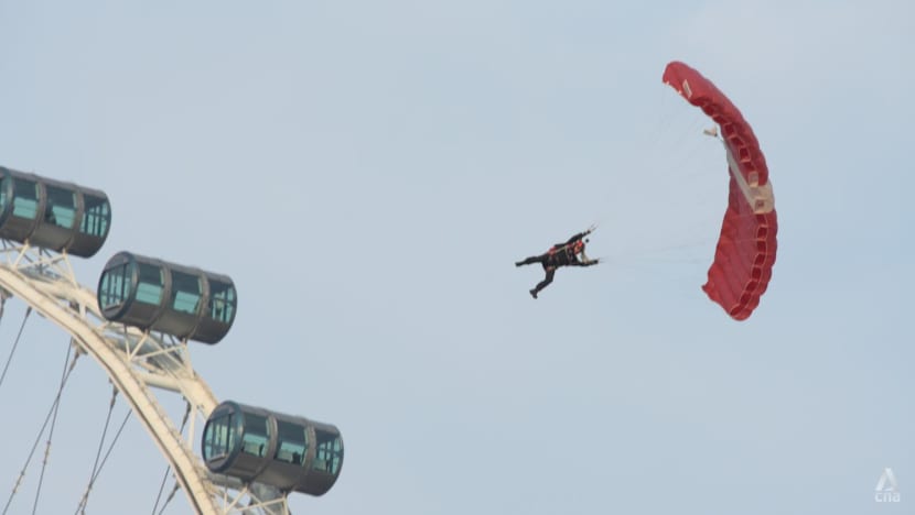 Sudden change in wind conditions contributed to Red Lions parachutist's hard landing at NDP: Ng Eng Hen Sudden change in wind conditions contributed to Red Lions parachutist's hard landing at NDP: Ng Eng Hen