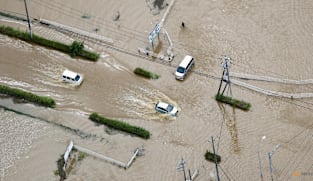 Record rain in Japan kills at least 8, leaves thousands stranded at Narita airport