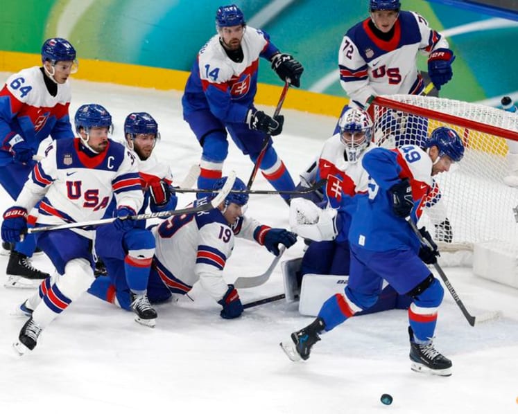 Ice hockey-US rout Slovakia to set up final showdown with Canada