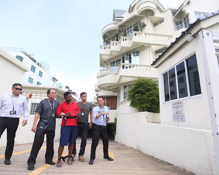 Loyang murder suspect brought back to crime scene