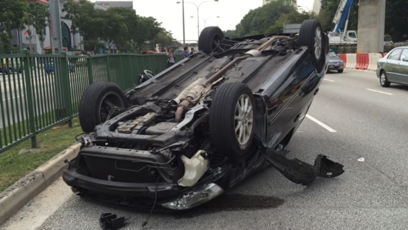 Car overturns after accident on Braddell Road