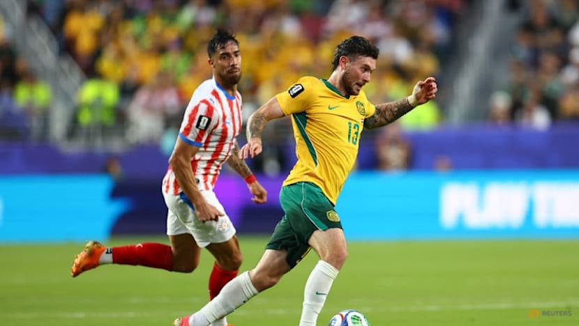 Australia reach World Cup knockouts after goalless draw with Paraguay