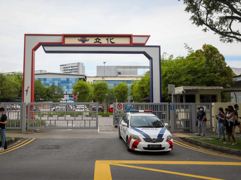 Police cars are seen at River Valley High School on July 19, 2021.