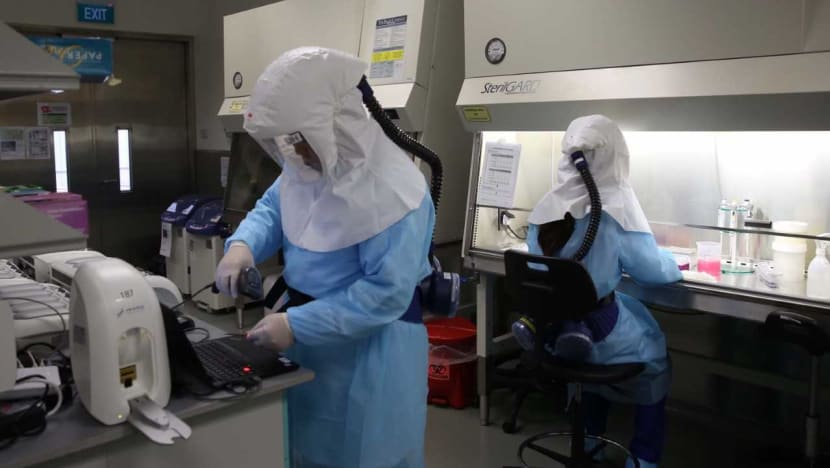 Explainer: What happens when a traveller is required to take a Covid-19 swab test at a Singapore checkpoint?