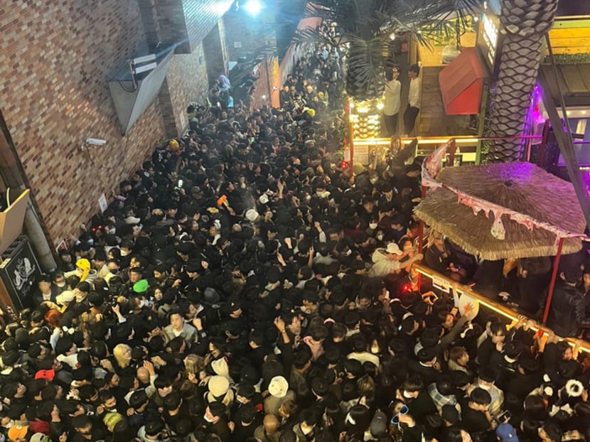 A scene showing part of the crowd trapped in a narrow alleyway in Seoul's Itaewon district on Oct 29, 2022. A scene showing part of the crowd trapped in a narrow alleyway in Seoul's Itaewon district on Oct 29, 2022.