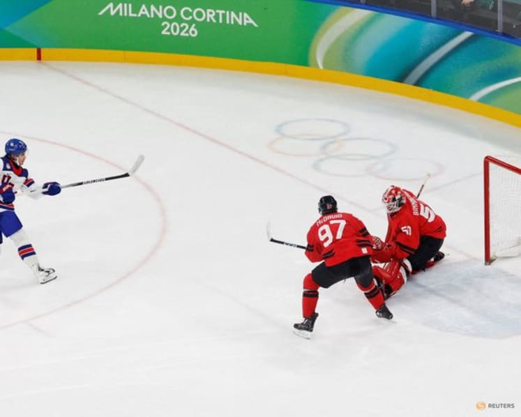 Ice hockey-US claim long-awaited gold by beating rivals Canada in overtime thriller