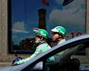 Vietnam's Grab drivers call for two-day app boycott over falling earnings