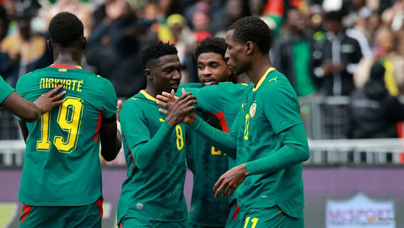 Defiant Senegal display Afcon trophy before beating Peru in friendly