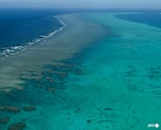 China says intercepted Philippine ships at disputed South China Sea shoal