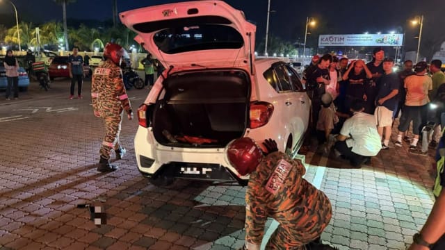 跃下马路遭撞飞卷车底 中国男子怡保玩滑板酿祸