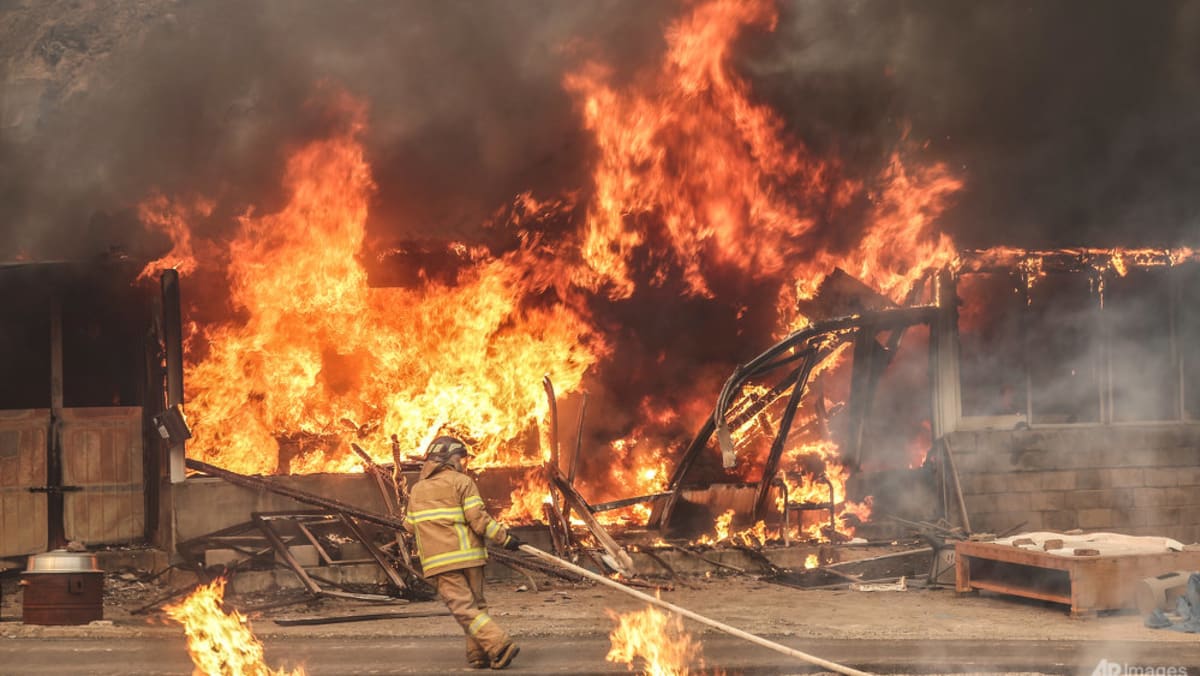 Strong winds fan South Korea wildfires as death toll climbs to 18 Strong winds fan South Korea wildfires as death toll climbs to 18