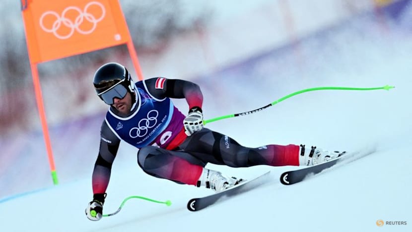 Alpine skiing-Franzoni puts Italy on top in men's combined after downhill, Swiss and French lurk