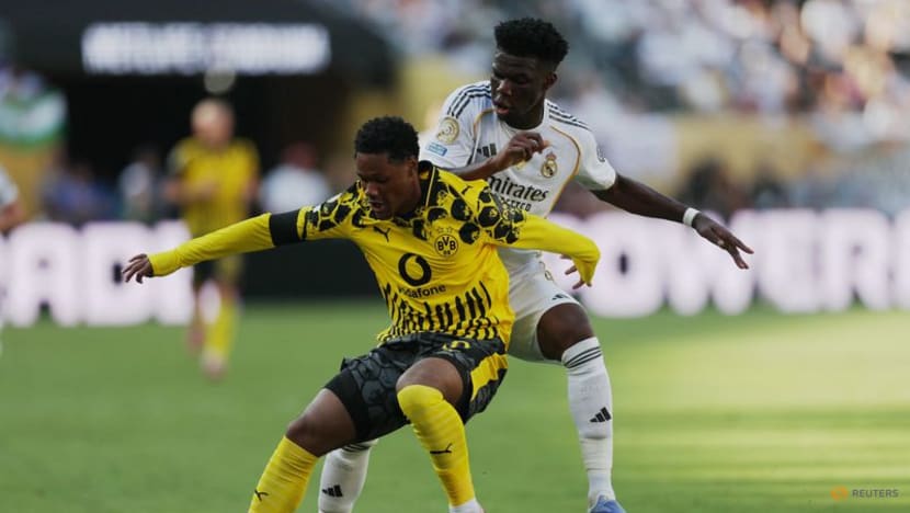 Real Madrid survive Dortmund scare to reach Club World Cup semis Real Madrid survive Dortmund scare to reach Club World Cup semis