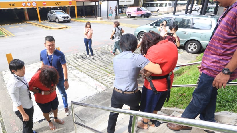 Murder suspect’s husband charged with maid abuse