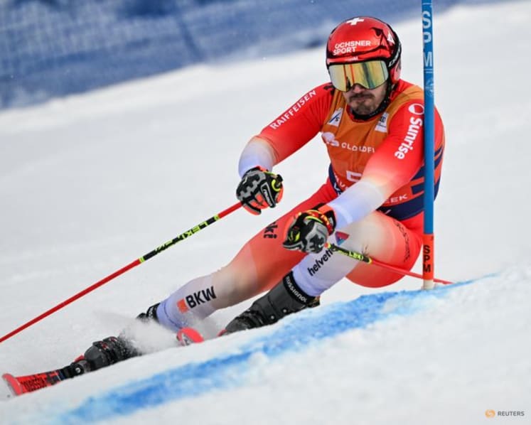 Alpine skiing-Swiss trio sweep men's giant slalom in Val d'Isere
