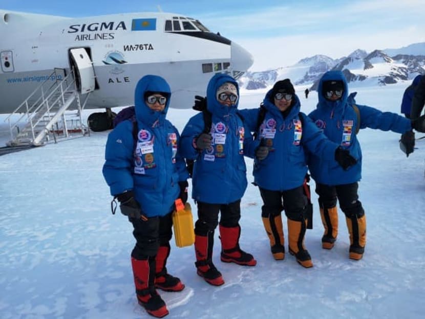 The All Women Expedition to Antarctica team poses for a photo after arriving at Union Glacier in Antarctica.
