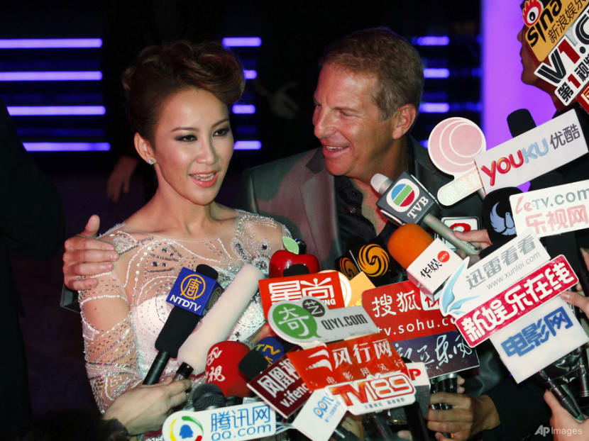 Coco Lee's estranged husband faced insults from her fans at late singer's cremation service