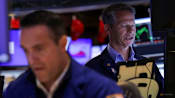 Stocks retreat, gold hits record as US government shuts down 