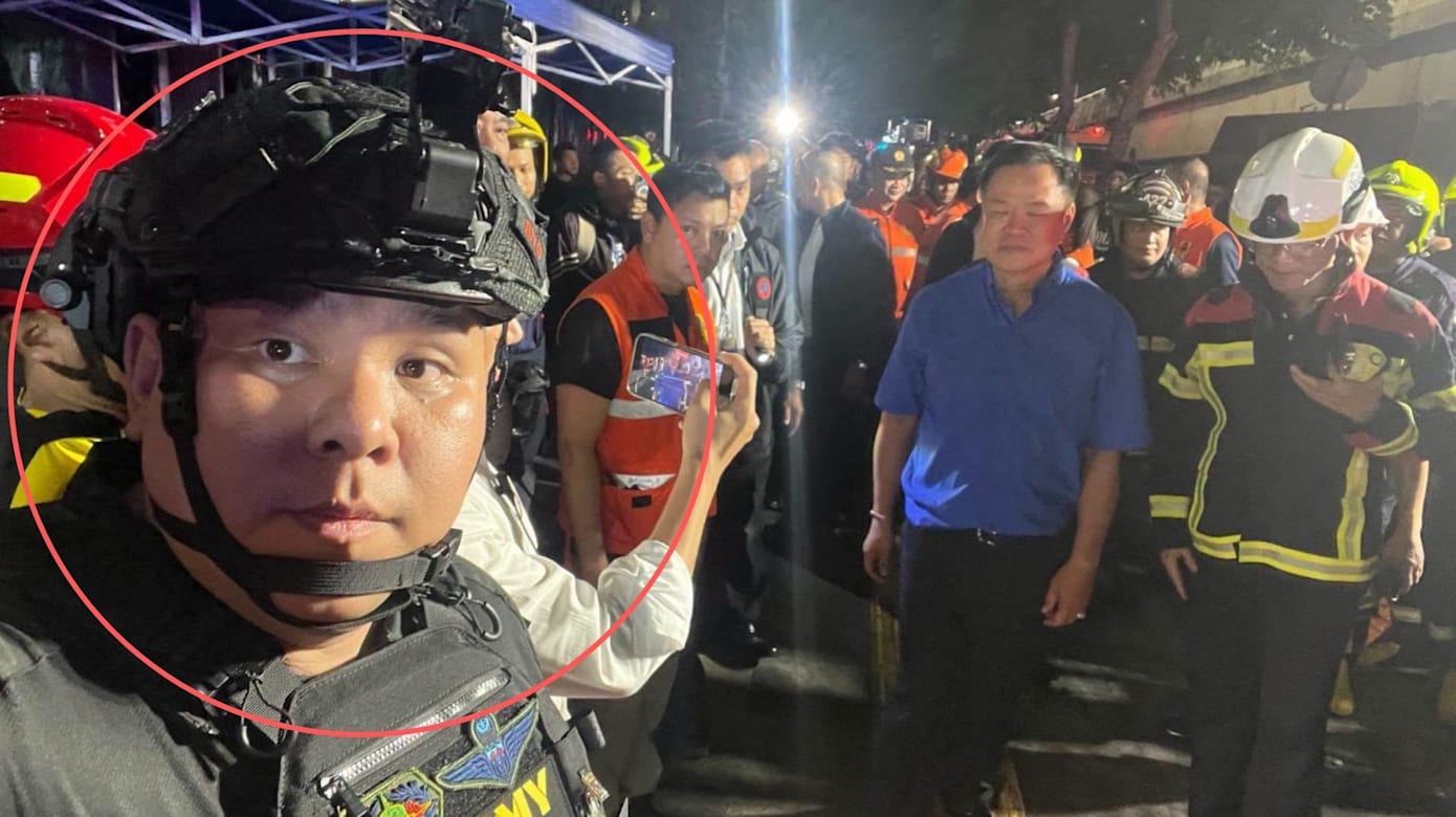 身穿军装陪同首相视察火灾现场 泰国男子竟非政府官员？