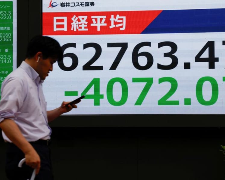 Japan's Nikkei rallies after steep decline as focus turns to tech results