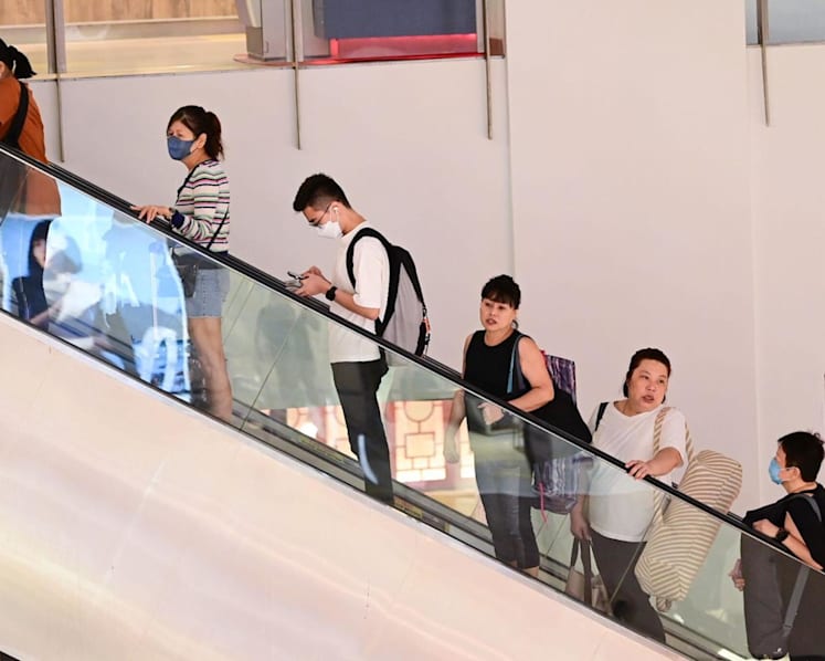 Many people still masked up in shopping malls on first day of eased restrictions 