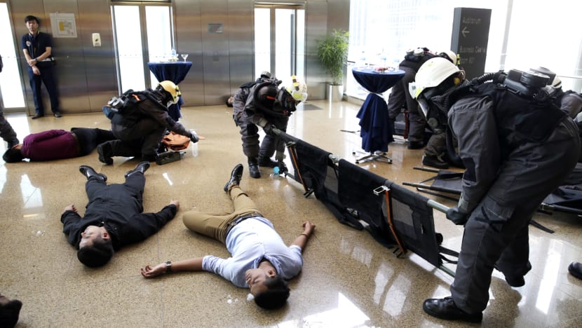 The Big Read: Gunfire on Paris streets sends a jolt halfway around the world