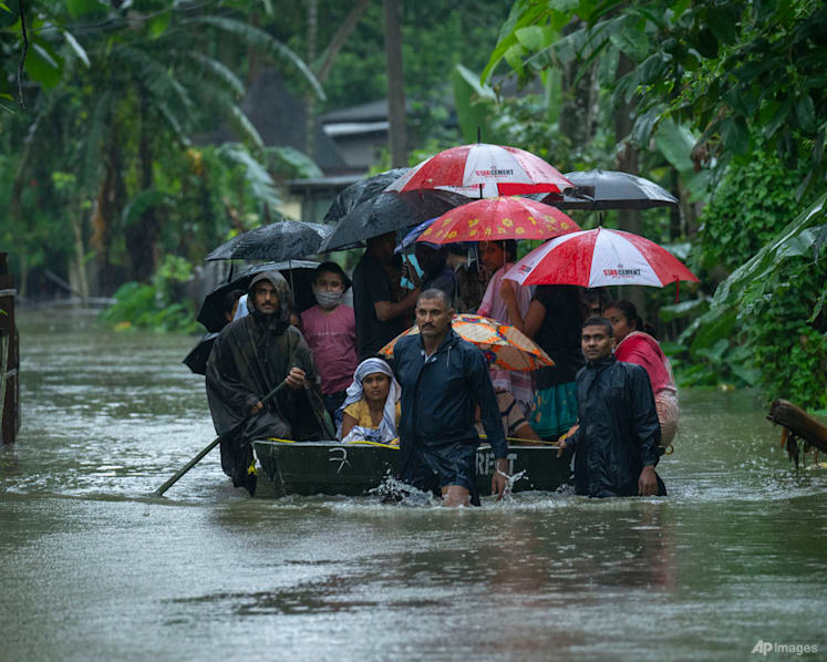 Death toll rises, millions stranded as monsoon floods ravage India and Bangladesh