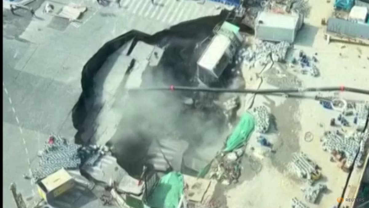 Massive sinkhole swallows road, part of construction site near downtown Shanghai