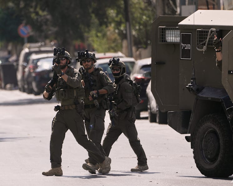 Palestinians bury four killed in West Bank clash with Israeli settlers
