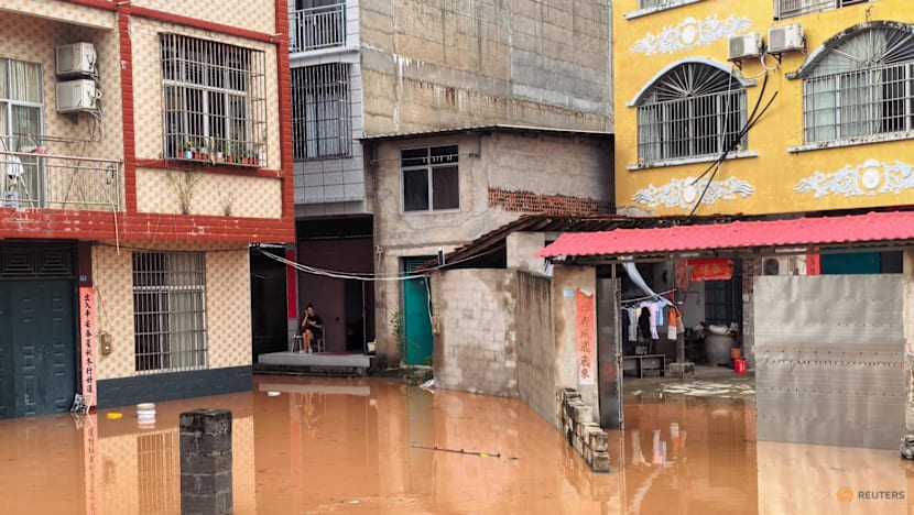 Homes submerged, tens of thousands relocated in China's south as flooding intensifies