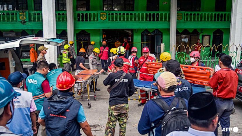 Five survivors pulled from Indonesia school collapse as rescuers race against time