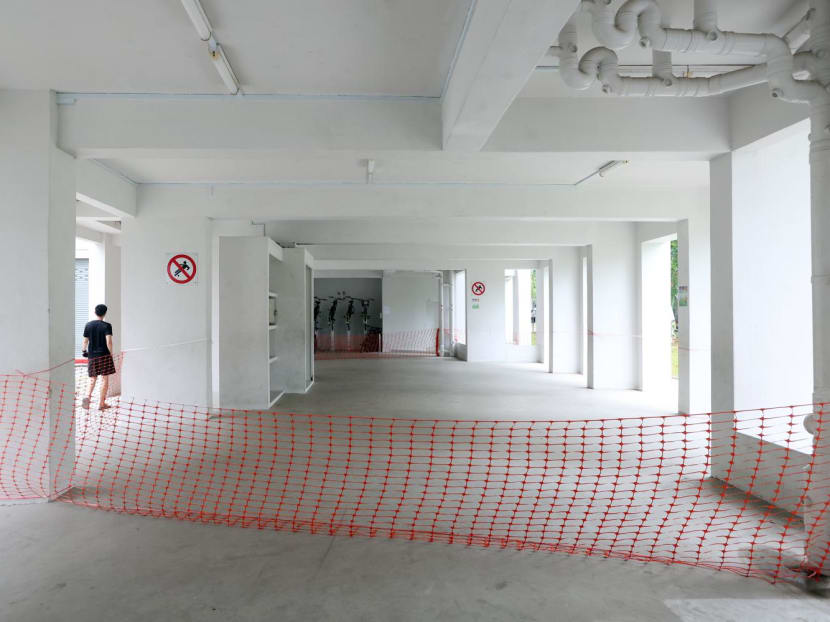 The void deck at Block 638 Woodlands Ring Road has been partially barricaded, as seen on Nov 30, 2023.