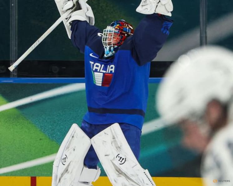 Ice hockey-Italy's 'family' team hungry for more after breakthrough win, says coach