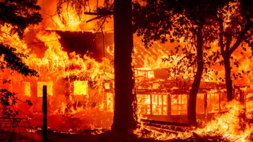 California's largest fire burns homes as blazes scorch West